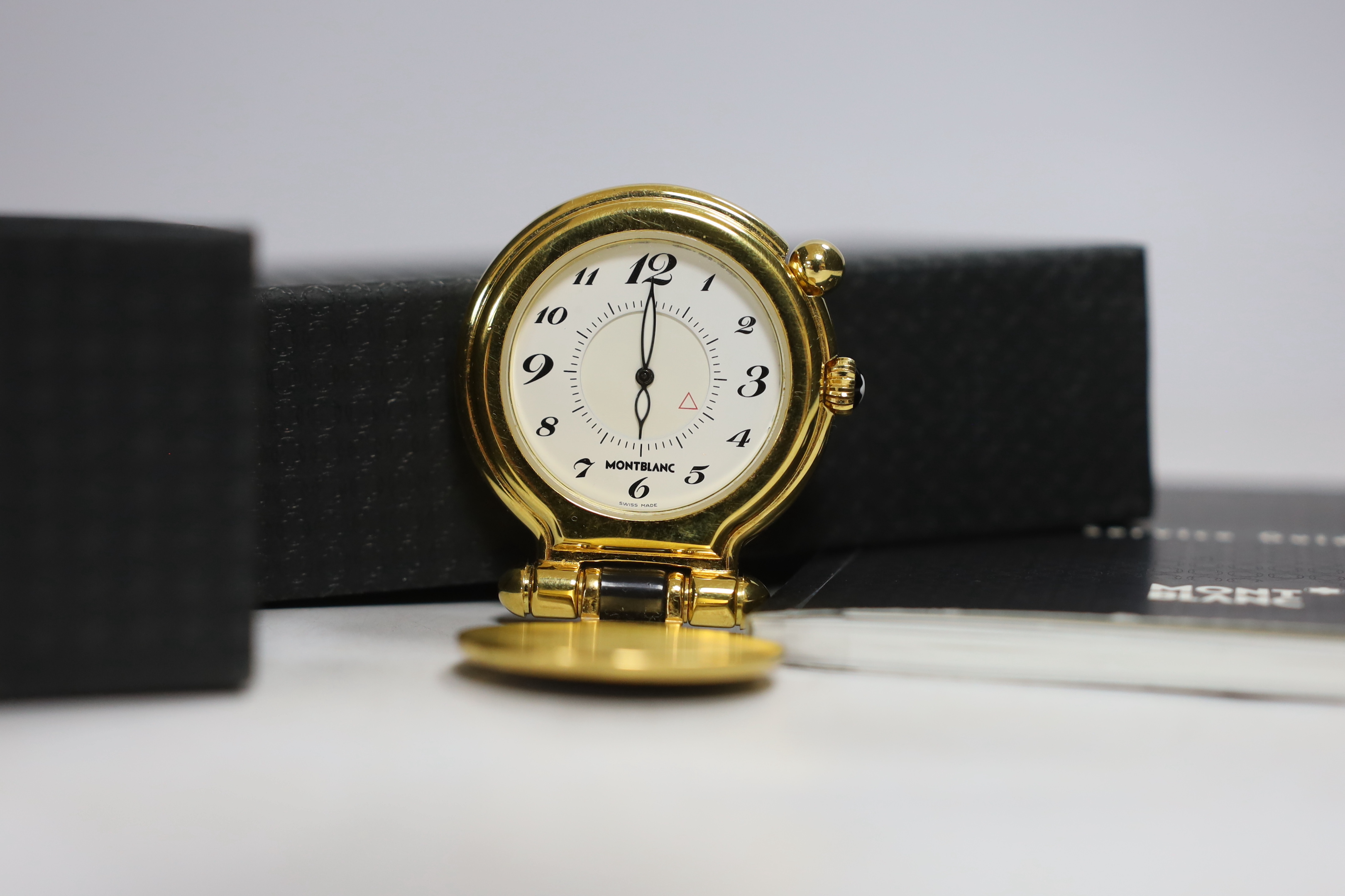 A cased Montblanc travelling timepiece with case and booklet